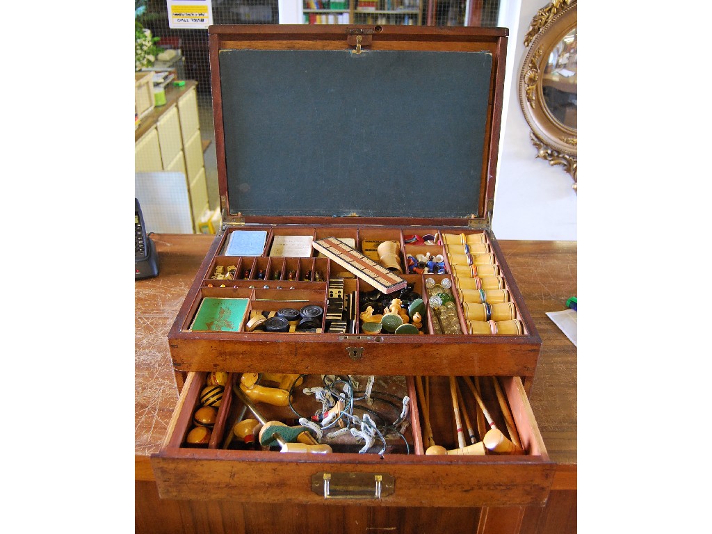 Appraisal: Victorian mahogany cased games compendium the hinged lid enclosing a