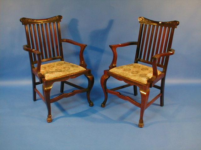 Appraisal: A pair of Chippendale style mahogany carver chairs with acanthus