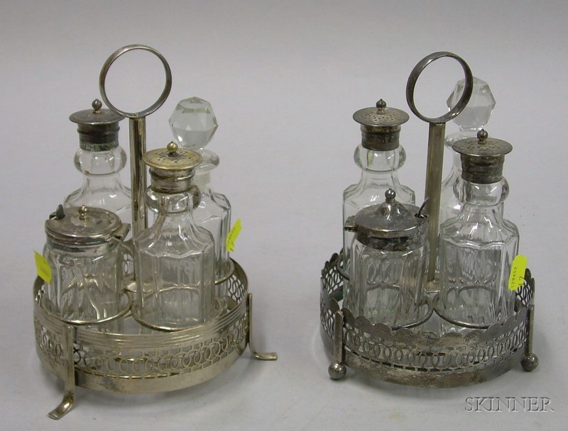 Appraisal: Two Four-bottle Silver Plated Caster Sets ht approx in