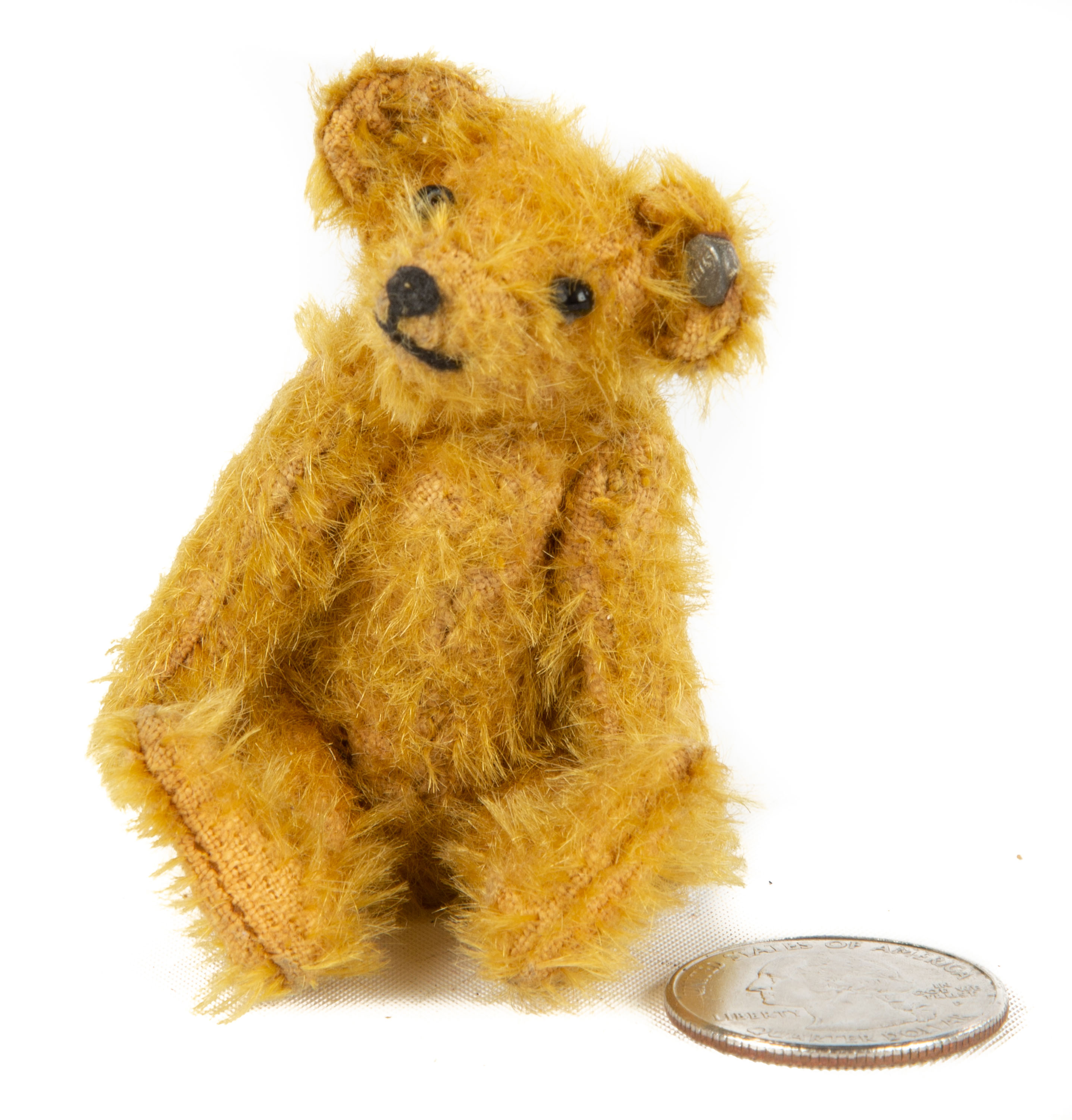 Appraisal: MINIATURE STEIFF TEDDY BEAR WITH BUTTON Early th century