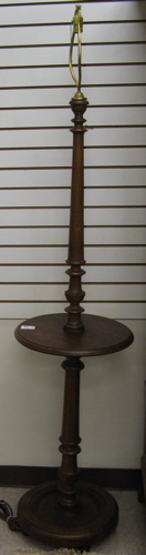 Appraisal: OAK FLOOR LAMP Continental early th century having a round