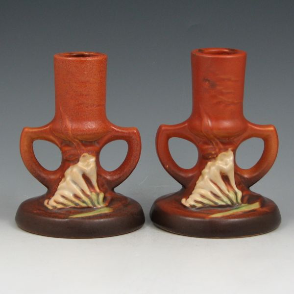 Appraisal: Pair of Roseville Freesia candleholders in brown Marked Roseville USA