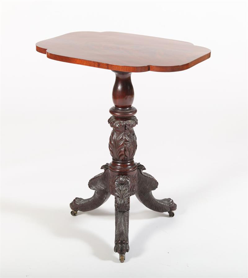 Appraisal: CLASSICAL CARVED MAHOGANY TILT-TOP TABLE NEW YORK The quatrefoil-shaped top