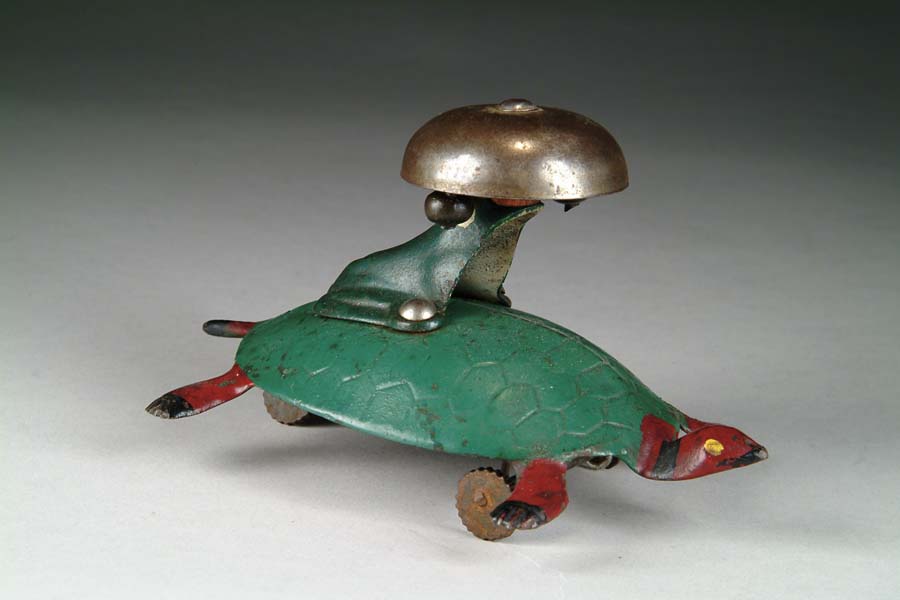 Appraisal: TORTOISE WITH FROG ON HIS BACK BELL TOY Of unknown