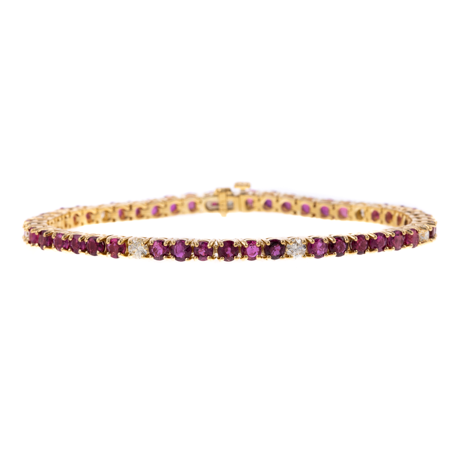 Appraisal: A RUBY DIAMOND LINE BRACELET IN K K yellow gold