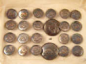 Appraisal: A card of silver plated buttons small two large with