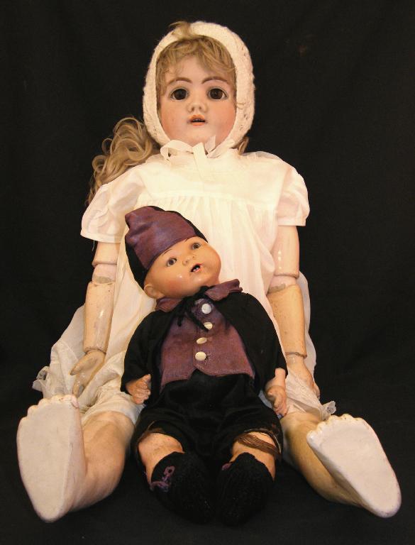 Appraisal: Max Handwerk German doll with bisque head and ball jointed