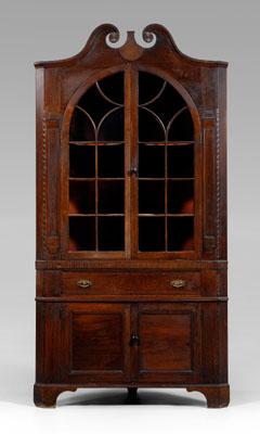 Appraisal: Important North Carolina Swisegood corner cupboard single-case construction figured walnut