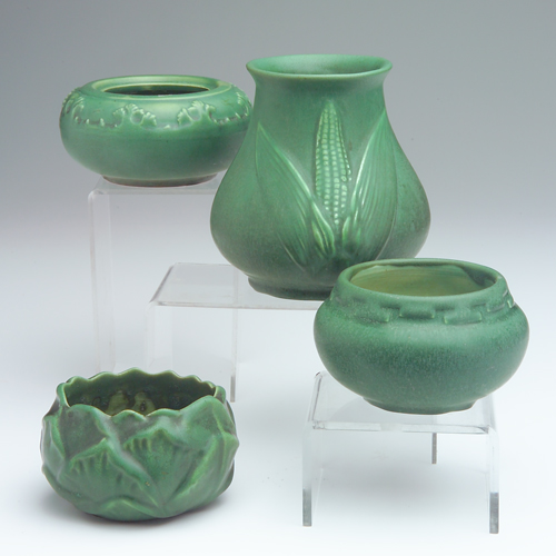 Appraisal: HAMPSHIRE Four vessels covered in matte green glaze a corn