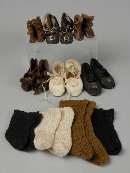 Appraisal: Pairs of Antique Doll Shoes Some Socks Description Jumeau brown