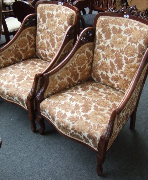 Appraisal: A pair of Edwardian mahogany framed armchairs the pierced and