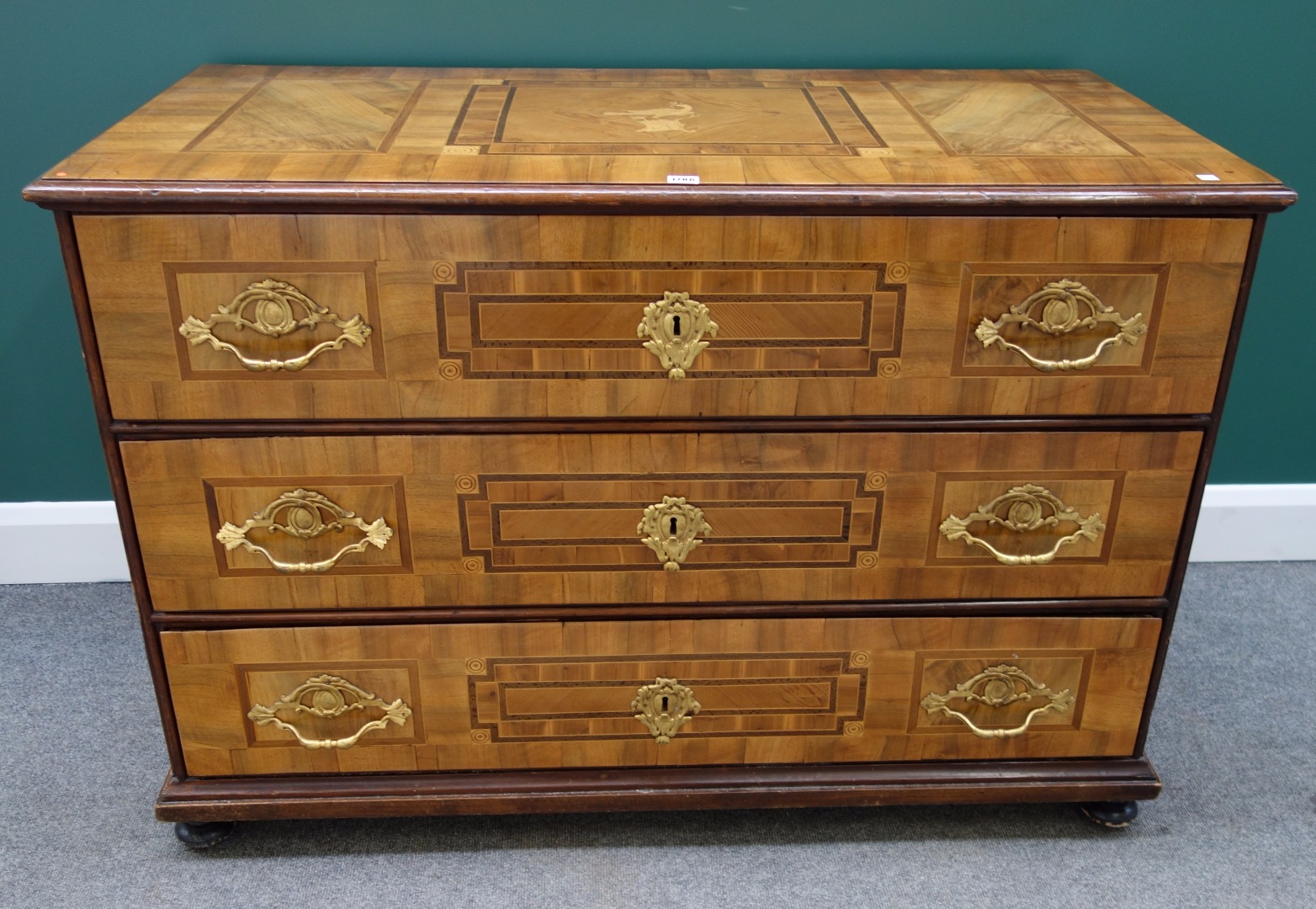 Appraisal: A late th century German parquetry inlaid gilt metal mounted