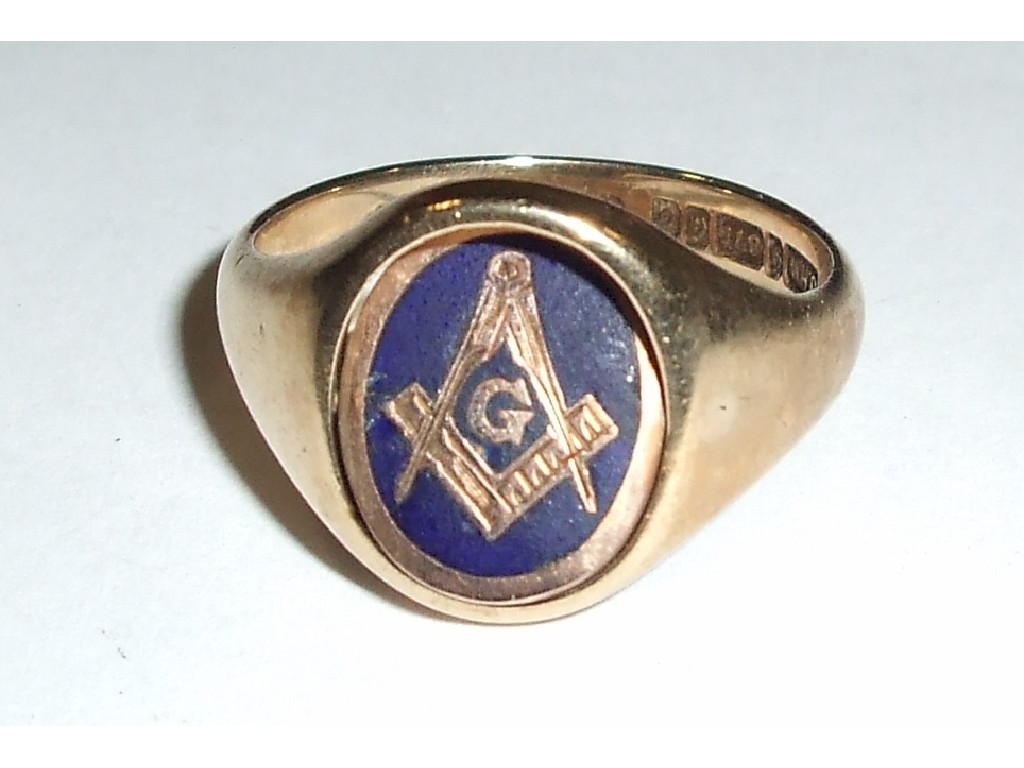 Appraisal: Nine carat gold masonic swivel ring