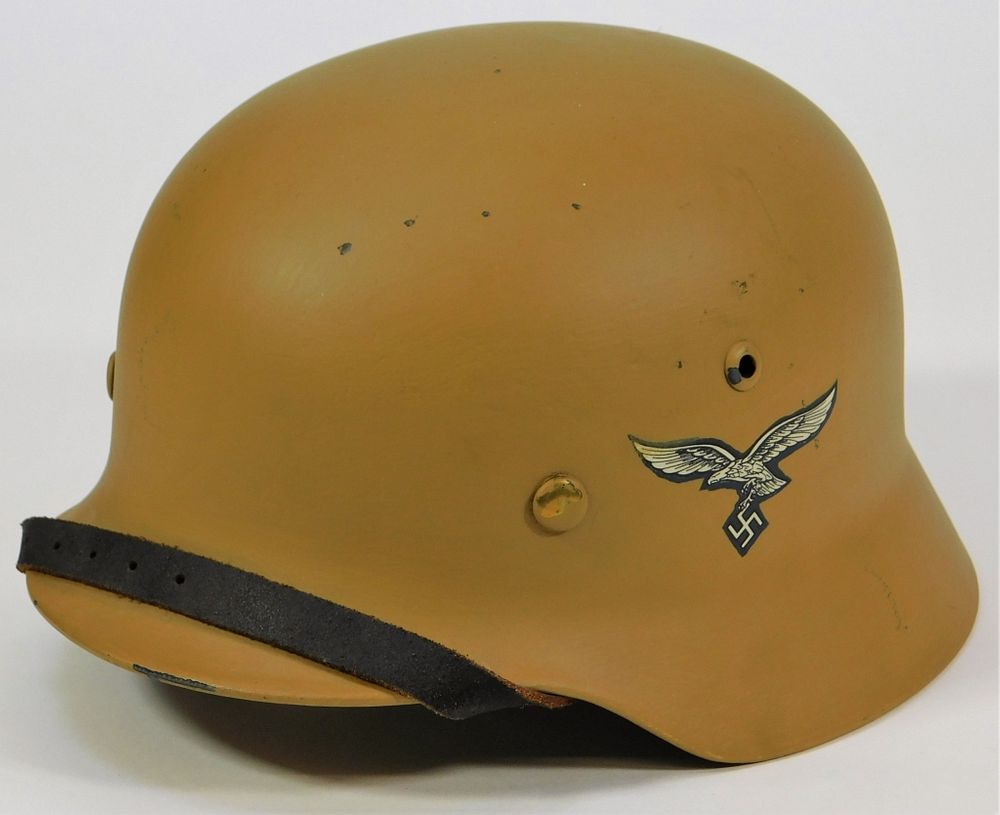 Appraisal: Repainted German Luftwaffe M- Helmet Germany Model size shell with