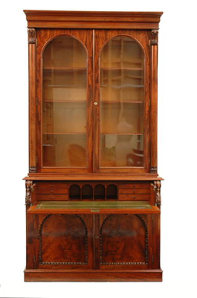 Appraisal: A WILLIAM IV FLAME MAHOGANY SECRETAIRE BOOKCASE The ogee cornice