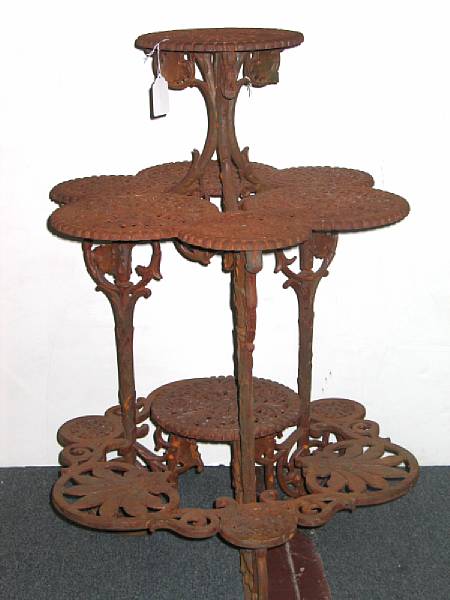 Appraisal: A pair of Victorian cast iron plant stands modern height