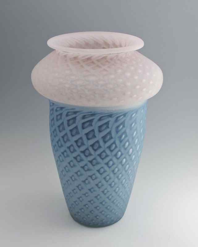 Appraisal: BI-COLORED ITALIAN GLASS VASE Heavy lattice and bubble pink glass