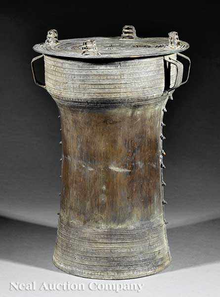 Appraisal: A Southeast Asian Bronze Rain Drum cylindrical splayed base with