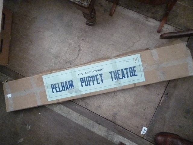 Appraisal: A GROUP OF SEVEN PELHAM PUPPETS with boxes together with