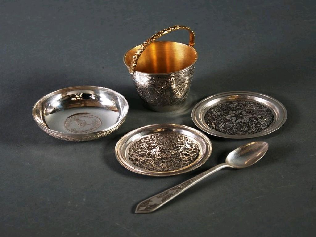 Appraisal: PERSIAN SILVER COLOURED METAL ASHTRAY with coin centre and engraved