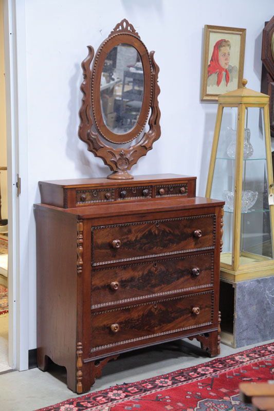 Appraisal: CHEST OF DRAWERS WITH MIRROR Cherry having flame grain mahogany