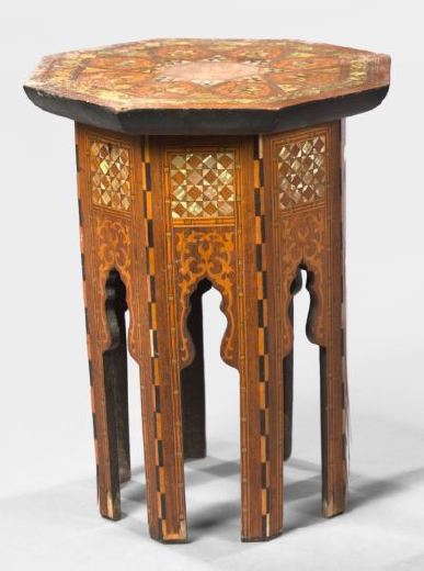 Appraisal: North African Carved Hardwood Chairside Table of octagonal form with