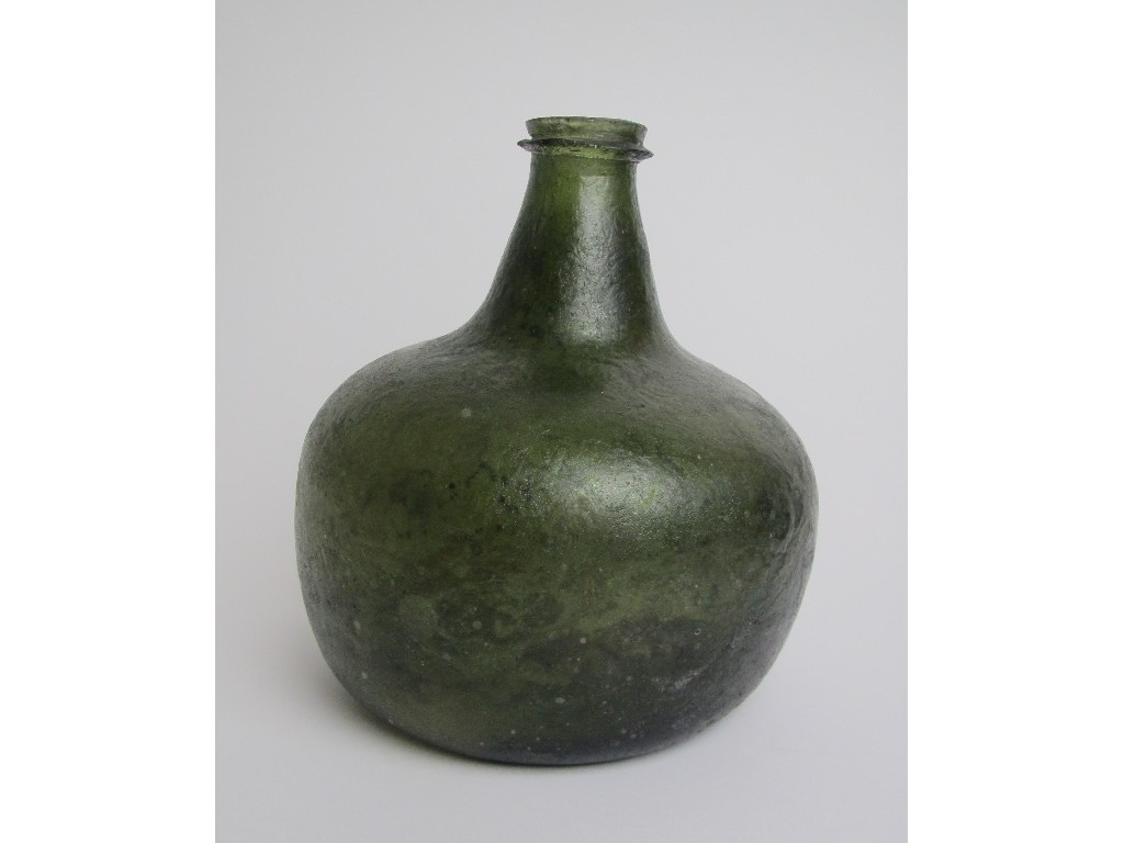 Appraisal: An th Century green glass wine bottle of onion form