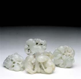 Appraisal: FOUR ANTIQUE JADE ANIMAL TOGGLES Group of four antique Chinese