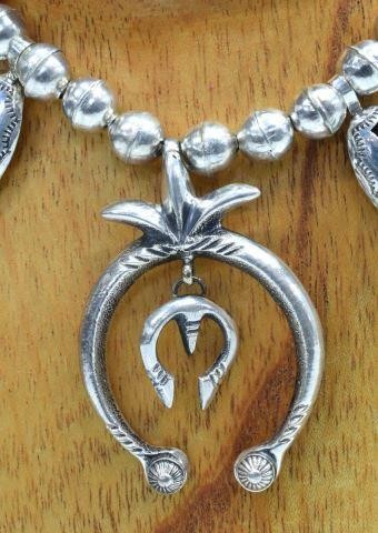 Appraisal: Native American squash blossom necklace assembled silver content unknown bench