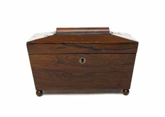 Appraisal: A Regency Rosewood Veneered Tea Caddy of casket form raised