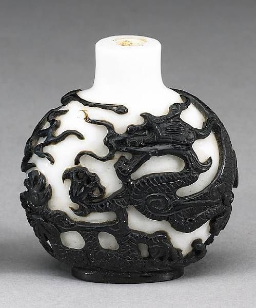 Appraisal: A black overlay white glass snuff bottle th Century The