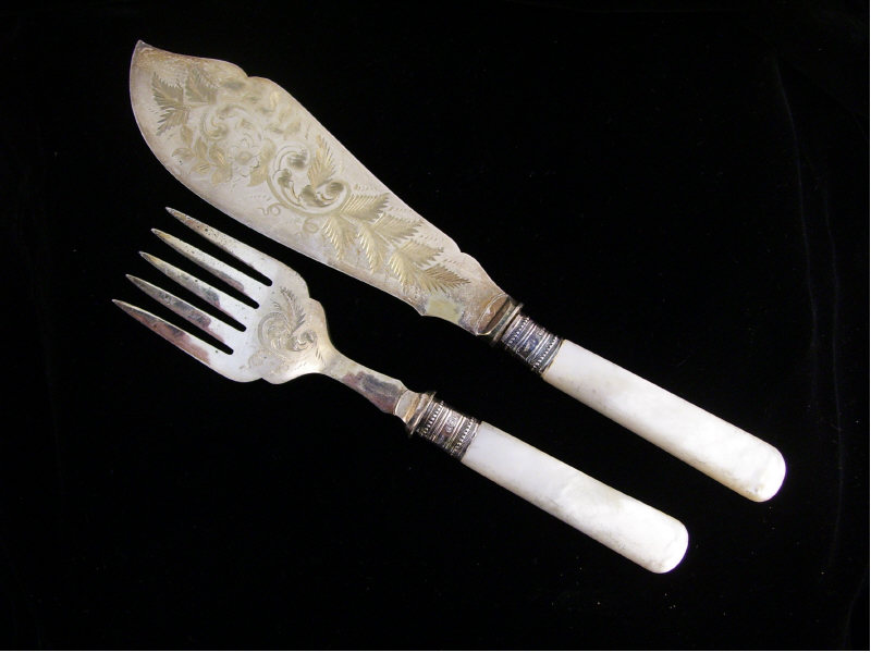 Appraisal: pc Pearl Handled Serving Lot Includes Serving fork with pearl