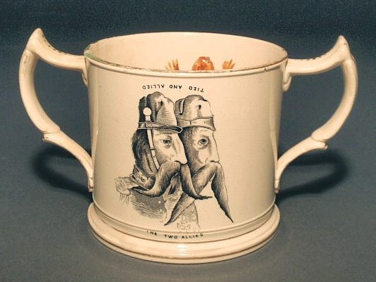 Appraisal: Staffordshire frog mug with transfer decorated The Two Allies and