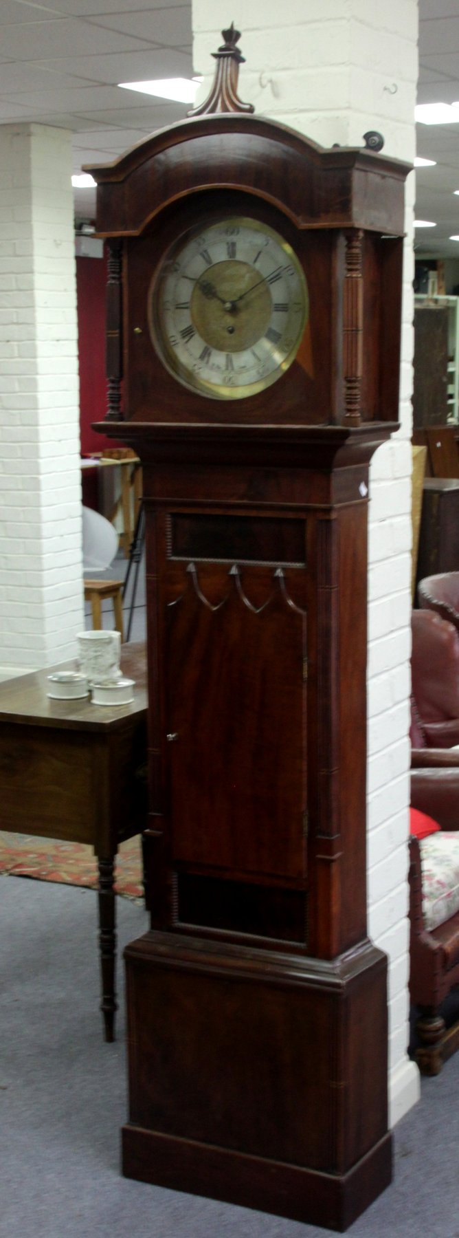 Appraisal: A mahogany cased longcase clock circa the later circular silvered