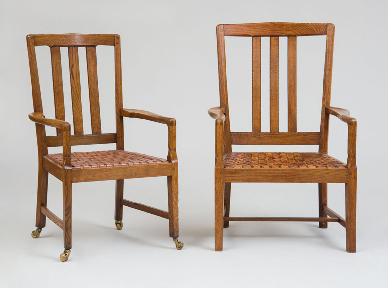 Appraisal: GORDON RUSSELL TWO COTSWALD SCHOOL ENGLISH ARMCHAIRS Oak woven leather