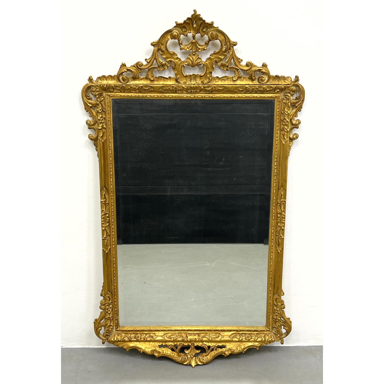 Appraisal: Carvers Guild Carved Wood Decorator Mirror Gilt finish Dimensions H