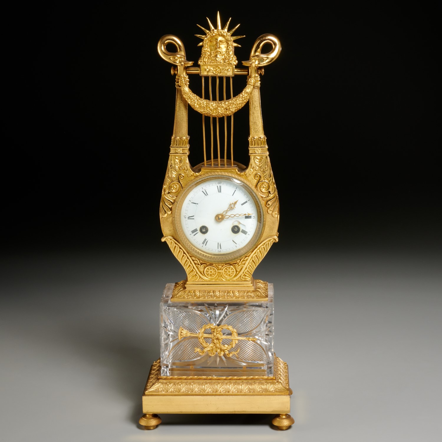 Appraisal: EMPIRE ORMOLU AND CRYSTAL LYRE-FORM MANTEL CLOCK th th c