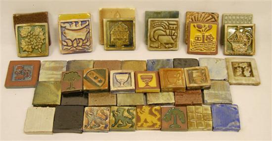 Appraisal: Moravian pottery tiles approximately forty twenty with various relief designs