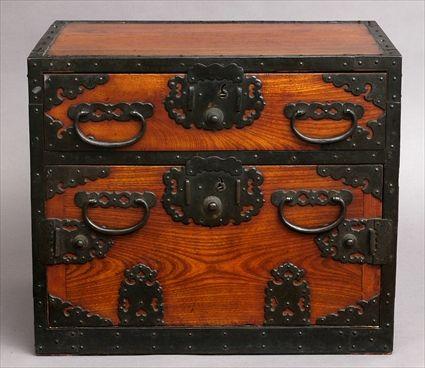 Appraisal: JAPANESE IRON-MOUNTED ELM TABLE CABINET With nailed iron edge containing