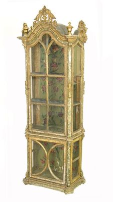 Appraisal: A Venetian polychrome decorated dwarf display cabinet in two parts