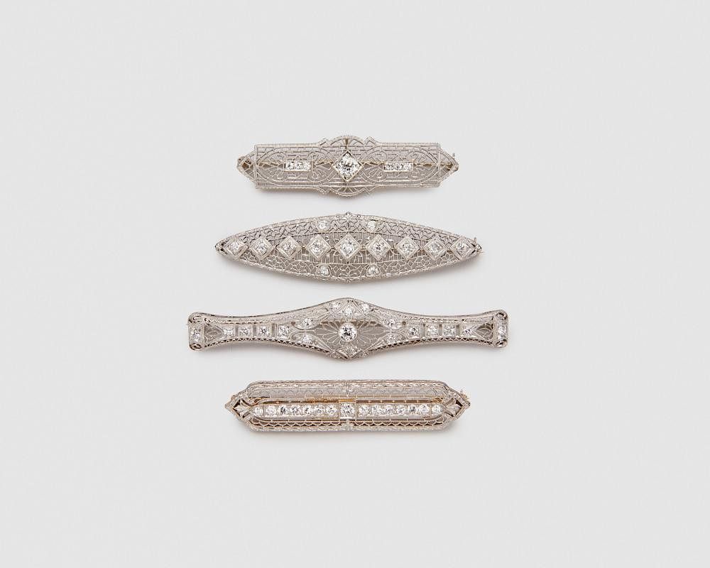 Appraisal: Four Edwardian Diamond Bar Brooches Four Edwardian Diamond Bar Brooches