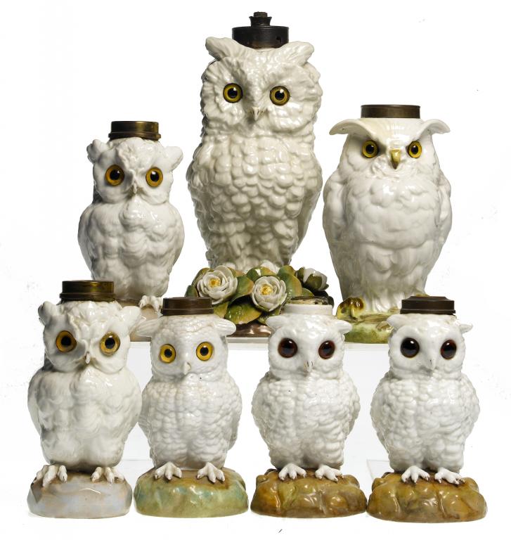 Appraisal: SEVEN PORCELAIN OWL NOVELTY OIL LAMPS one English and probably