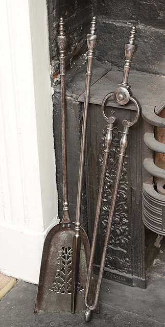 Appraisal: A SET OF THREE POSSIBLY GEORGIAN POLISHED STEEL FIRE IRONS