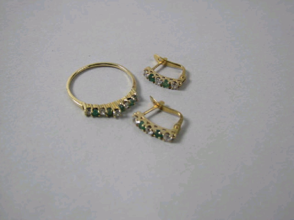 Appraisal: A Continental half Eternity Ring set green and white stones