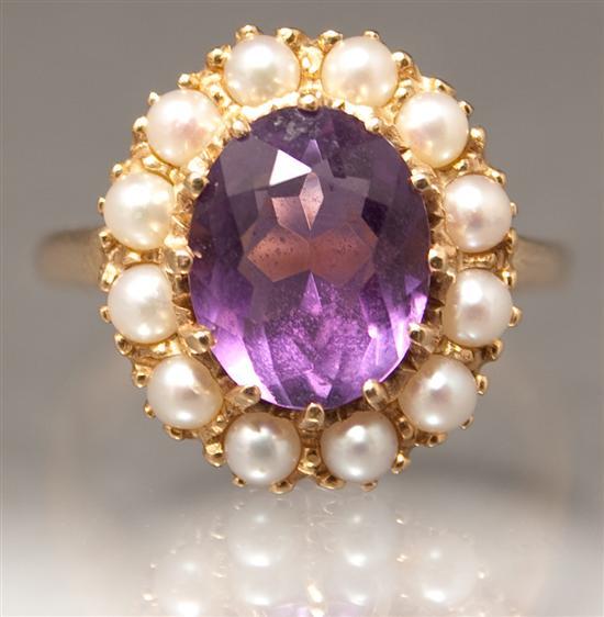 Appraisal: Lady's K yellow gold amethyst and pearl dinner ring amethyst