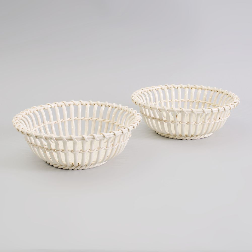 Appraisal: Pair of Royal Vienna Creamware Ribbon Baskets Both with impressed