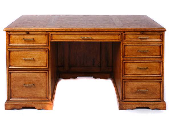 Appraisal: A George III style oak and mahogany knee hole desk