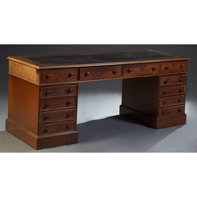 Appraisal: English Carved Mahogany Desk th c the rectangular ogee top