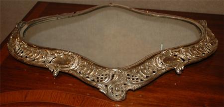 Appraisal: Rococo Style Silver Plated and Mirrored Cartouche-Form Plateau Estimate -