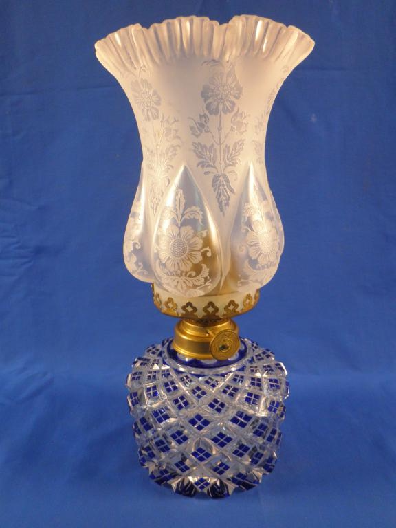 Appraisal: A Victorian oil lamp the Bohemian type base in blue